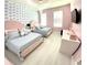 Two twin beds in a pink bedroom with blue and white patterned wallpaper and a TV at 2104 Fleming Mist Pl, Kissimmee, FL 34747