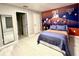 bedroom with Space Jam theme, full-size bed, and ample floor space at 2104 Fleming Mist Pl, Kissimmee, FL 34747