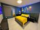 Simpsons-themed bedroom with yellow bedding at 2104 Fleming Mist Pl, Kissimmee, FL 34747