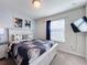 Themed bedroom with a full-size bed and TV at 8931 Sydney Ave, Kissimmee, FL 34747