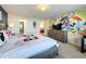 Main bedroom with Mickey and Minnie Mouse bedding at 8931 Sydney Ave, Kissimmee, FL 34747