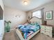 Bedroom with Lilo and Stitch bedding and wall decor at 8931 Sydney Ave, Kissimmee, FL 34747