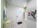 Bright entryway with tiled floors and built-in bench seating at 8931 Sydney Ave, Kissimmee, FL 34747