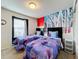 Bedroom with twin beds and Frozen mural at 8931 Sydney Ave, Kissimmee, FL 34747