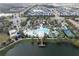 Community pool, lake, clubhouse, and tennis courts at 8931 Sydney Ave, Kissimmee, FL 34747