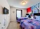 bedroom with twin beds and Frozen themed bedding at 8931 Sydney Ave, Kissimmee, FL 34747