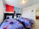 Bedroom with Frozen mural and two twin-size beds at 8931 Sydney Ave, Kissimmee, FL 34747