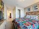 Bedroom with Marvel comics bedding and adjacent closet at 8931 Sydney Ave, Kissimmee, FL 34747