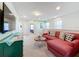 Living room with sectional sofa and coffee table at 8931 Sydney Ave, Kissimmee, FL 34747