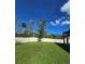 Spacious backyard with grassy area and privacy fence at 6097 Monterey Cypress Trl, Sanford, FL 32773