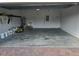 Spacious garage with utility sink and storage at 6097 Monterey Cypress Trl, Sanford, FL 32773