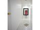 Long hallway with mirror and tiled floor at 6096 Peregrine Ave # C04, Orlando, FL 32819