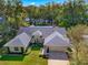 Aerial view of a single-Gathering home with a two-car garage at 143 Debary Dr, Debary, FL 32713