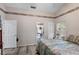 Bright bedroom with ensuite bathroom access and new flooring at 143 Debary Dr, Debary, FL 32713