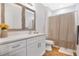 Clean bathroom with white vanity, bathtub, and updated fixtures at 1780 Grand Oak Dr, Apopka, FL 32703