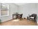 Bright home office features wood floors and a window at 1780 Grand Oak Dr, Apopka, FL 32703