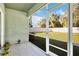 Screened porch overlooks backyard with grassy area at 1780 Grand Oak Dr, Apopka, FL 32703