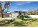 Front view of a house with a driveway at 1780 Grand Oak Dr, Apopka, FL 32703