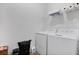 Laundry room with washer, dryer, and shelving at 1780 Grand Oak Dr, Apopka, FL 32703