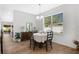 Charming dining room with a round table and four chairs at 1780 Grand Oak Dr, Apopka, FL 32703