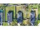 Aerial view of houses with solar panels and pools at 1780 Grand Oak Dr, Apopka, FL 32703