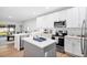 Modern kitchen with white cabinets and a kitchen island at 1780 Grand Oak Dr, Apopka, FL 32703