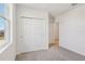 Bright bedroom with double door closet and neutral carpeting at 2169 Rosewood Dr, Bartow, FL 33830