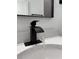 Bathroom sink with black faucet and white quartz countertop at 6208 Sw 129, Ocala, FL 34473