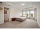 Large main bedroom with plush carpeting and plenty of natural light at 9747 Lost Creek Dr, Winter Garden, FL 34787