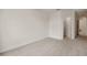 Empty bedroom with neutral walls, carpet, and a large closet at 9747 Lost Creek Dr, Winter Garden, FL 34787