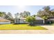 Charming ranch home with attached garage and manicured lawn at 796 Humphrey Cir, Deltona, FL 32738