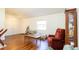 Comfortable living room with hardwood floors and cozy seating at 796 Humphrey Cir, Deltona, FL 32738