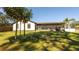 Charming house exterior with a well-maintained lawn at 796 Humphrey Cir, Deltona, FL 32738