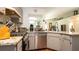 Efficient kitchen with granite counters and ample cabinet space at 796 Humphrey Cir, Deltona, FL 32738
