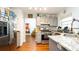 Updated kitchen featuring granite countertops and stainless steel appliances at 796 Humphrey Cir, Deltona, FL 32738