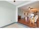 Sunroom with view into the living room and kitchen at 22011 Belgian Ct, Mount Dora, FL 32757