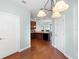 Bright dining room with hardwood floors and access to kitchen at 22011 Belgian Ct, Mount Dora, FL 32757