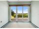 Sunroom with sliding glass doors leading to backyard patio at 22011 Belgian Ct, Mount Dora, FL 32757