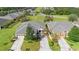 Aerial view of two homes with attached garages at 22011 Belgian Ct, Mount Dora, FL 32757