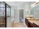 Double vanity bathroom with soaking tub and walk-in shower at 22011 Belgian Ct, Mount Dora, FL 32757