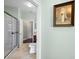 Bathroom with a shower, toilet and access to another room at 22011 Belgian Ct, Mount Dora, FL 32757