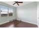 Simple bedroom with wood flooring and a bed frame at 22011 Belgian Ct, Mount Dora, FL 32757