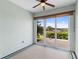 Bright sunroom with sliding glass doors leading to the outdoors at 22011 Belgian Ct, Mount Dora, FL 32757