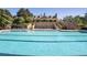 Resort-style pool with clubhouse in the background at 22011 Belgian Ct, Mount Dora, FL 32757
