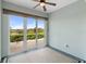 Sunroom features a view and sliding glass doors at 22011 Belgian Ct, Mount Dora, FL 32757