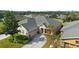 Aerial view of single Gathering home and driveway at 22011 Belgian Ct, Mount Dora, FL 32757