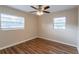 Spacious bedroom with hardwood floors and ceiling fan at 3121 Bon Air Dr, Orlando, FL 32818