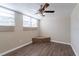 Cozy bedroom with hardwood floors and built-in seating at 3121 Bon Air Dr, Orlando, FL 32818