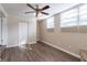 Bright bedroom with hardwood floors and ample closet space at 3121 Bon Air Dr, Orlando, FL 32818