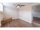 Bedroom with hardwood floors and built-in seating at 3121 Bon Air Dr, Orlando, FL 32818
